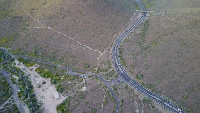 Aerial street shot over the mountains in Thunderbird Reservoir, Glendale, Arizona