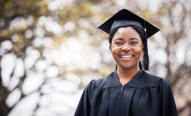 A quality education is so important. Portrait of a young woman on graduation day.