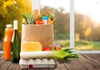 Different tasty fresh vegetables in shopping bag