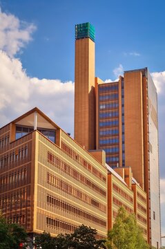 Berlin, Germany - April 30, 2014: modern building at Potsdamer Platz in Berlin. High rise building called Daimler Cit is designed by architect Renzo Piano.