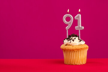 Candle number 91 - Cake birthday in rhodamine red background