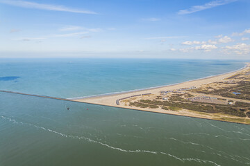 aerial view of Maasvlakte on a sunny day, North Sea and blue sky in the background, Netherlands. High quality photo