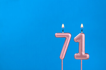 Candle number 71 - Birthday in blues foamy background