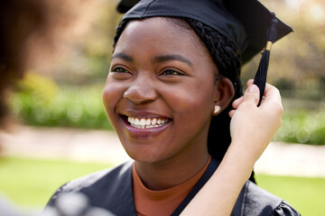 Focus on where you want to go. Closeup shot of a young woman standing with her friend on graduation...