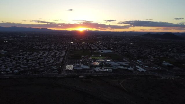 Sunset aerial shot over the mountains in Thunderbird Reservoir, Glendale, Arizona
