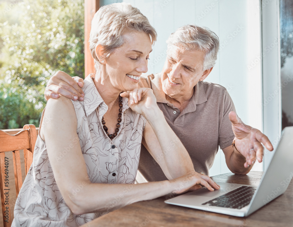 Poster what are you searching for. shot of a mature couple using a laptop while sitting outside.