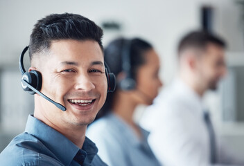 His problem solving capabilities are excellent. Portrait of a young call centre agent working in an...
