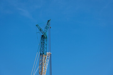 harbor cranes and blue sky background 
