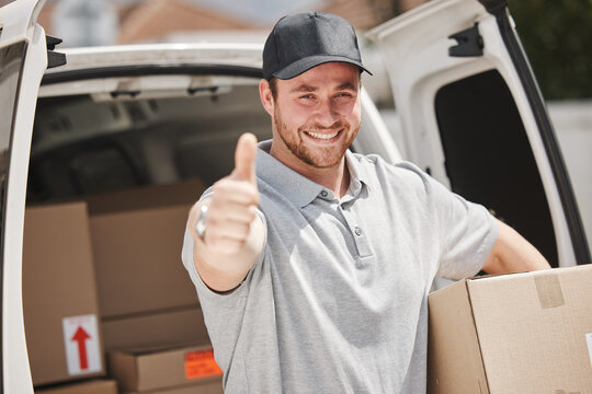I always make my deliveries on time. Cropped portrait of a handsome young delivery man giving thumbs up while out making deliveries.