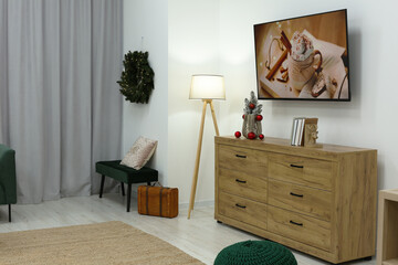 Living room interior with stylish furniture and elegant curtains