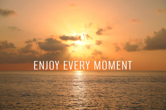 Enjoy every moment, affirmation. Beautiful sky over sea at sunset