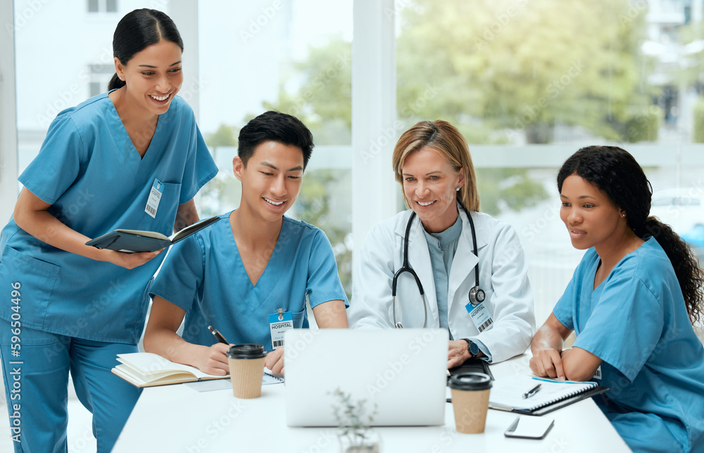 Poster theyre all visual learners. shot of a group of doctors in a meeting at a hospital.