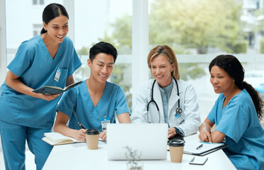 Theyre all visual learners. Shot of a group of doctors in a meeting at a hospital.