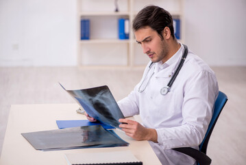 Young male doctor radiologist working in the clinic