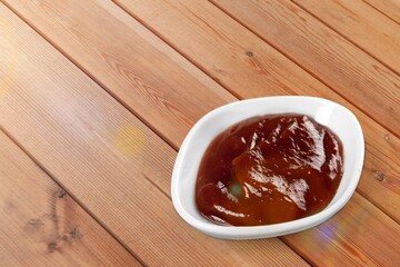 Delicious red ketchup in bowl, tomato sauce