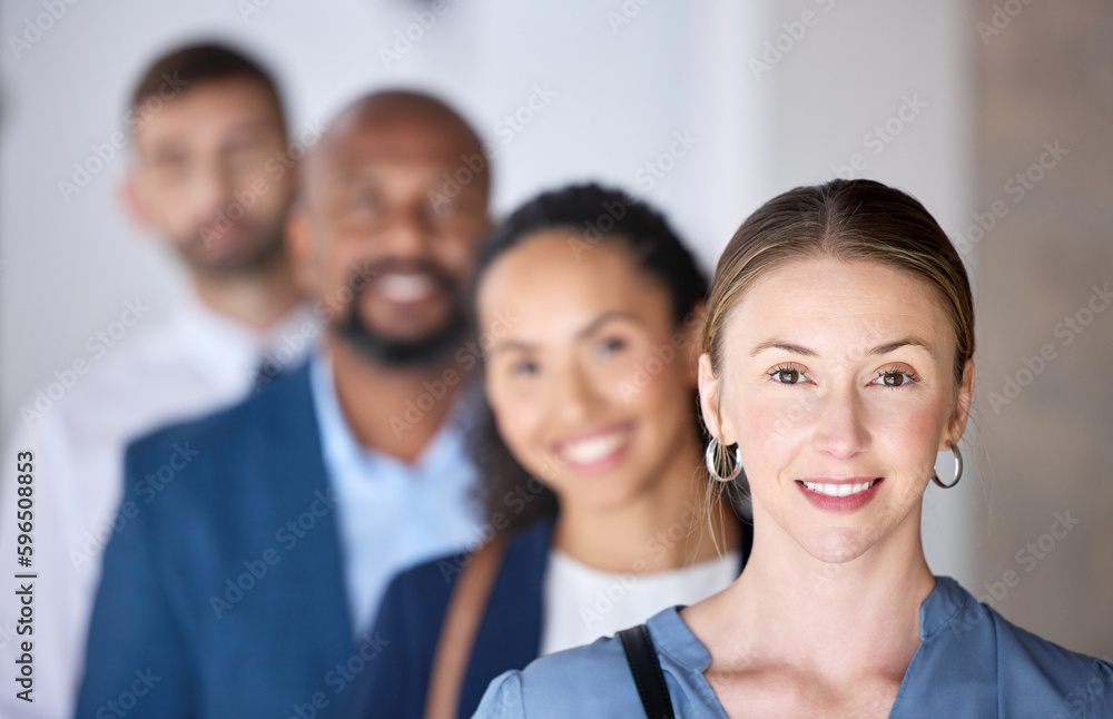 Aufkleber im first in line. shot of a group of businesspeople standing in a line at an office.