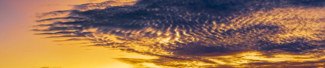 Fototapeta na wymiar High cloud sunrise panorama of the sky