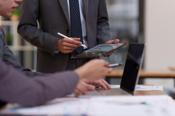 Fund managers team consultation and discuss about analysis Investment stock market. analysis, research finance