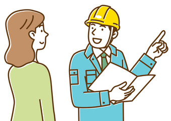 指差ししながら女性に説明する書類を持った男性作業員