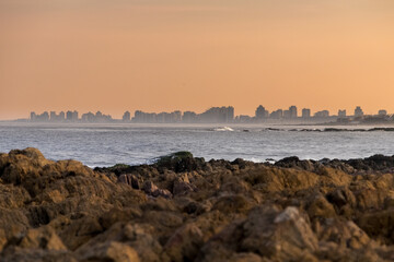 The Punta del Este skyline seen from afar, during a golden sunset