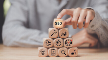 Marketer showing SEO concept,optimization analysis tools, search engine rankings, social media...