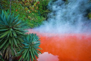 Beppu, Japan - Nov 25 2022: Chinoike Jigoku hot spring in Beppu, Oita. The town is famous for its onsen (hot springs). It has 8 major geothermal hot spots, referred to as the "eight hells of Beppu"