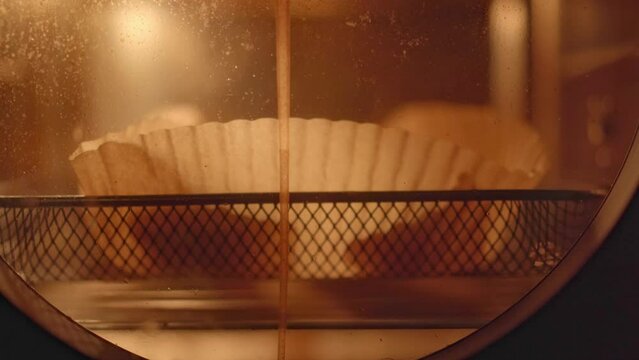 Baking cheese grillers in an air fryer with a non stick paper.