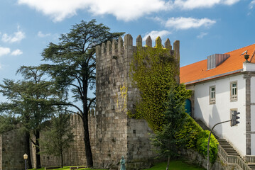 Fototapeta na wymiar Oporto, Portugal. April 13, 2022: San Fernando wall in day with beautiful blue sky.