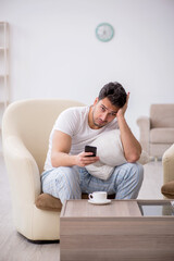 Fototapeta premium Young man starting day at home