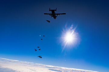 Skydivers Exit Silhouette 