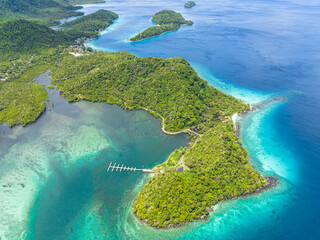 Aerial drone of lagoons and bays with turquoise water among the islands. Weh Island. Indonesia.