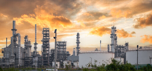 Fototapeta premium Petrochemical refinery with sunsetOil and Gas Industry - Refinery, Drone Shot, Oil Refinery and Petrochemical Plant at Twilight, Bangkok, Thailand.