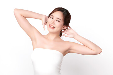Fototapeta na wymiar Beautiful Young Asian woman lifting hands up to show off clean and hygienic armpits or underarms on white background, Smooth armpit cleanliness and protection concept
