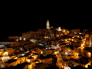 Matera, Italy. Amazing view of the Sassi of Matera at night. Landscape of the historical part of the town. An Unesco World Heritage Site. Touristic destination