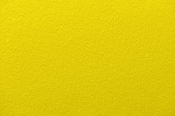 Yellow paint concrete wall texture background. 