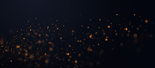 Golden abstract bokeh background. Background of abstract glitter lights on black isolated background. Holiday concept.