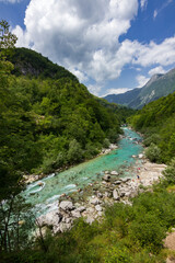 Fototapeta na wymiar Turquoise colored soça river near Kozjak waterfall in Slovenia