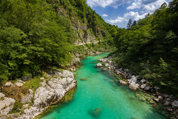 Naklejka na ściany i meble Turquoise colored soça river near Kozjak waterfall in Slovenia