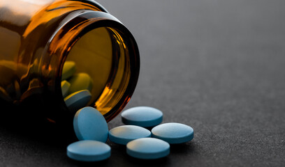 Medicines tablets and pill glass bottle, medications drugs.
