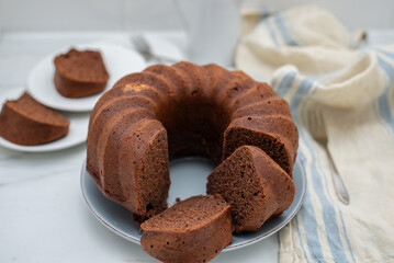 Chocolate Bundt Cake and a slice on a plate