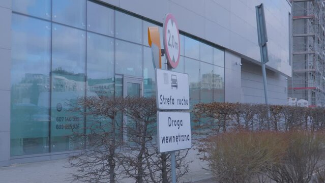 Swaying road signs during high winds. A hurricane rocking elements of the city's infrastructure