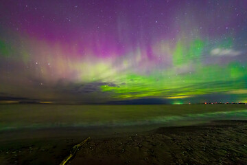 Spectacular Northern lights also known as aurora borealis in Southern Ontario over lake Huraon, Canada