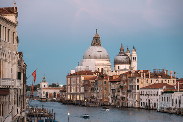 Mesmerizing view of the Salute a Roman Catholic church and minor basilica located in Punta della Dogana in the Dorsoduro Sestiere of Venice in Italy on a warm summer evening. Copyspace