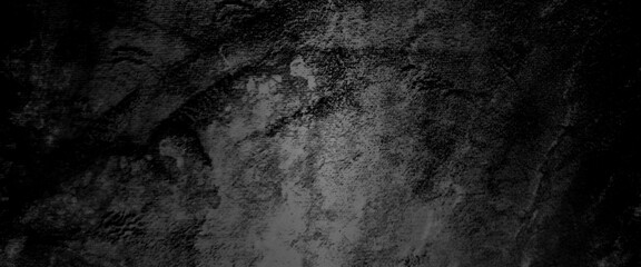 Abstract structured black concrete wall background, scary black grunge goth design. horror black background, Slightly light black concrete cement texture for background.