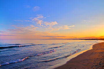 Sunrise over the city beach on the Spanish coast.