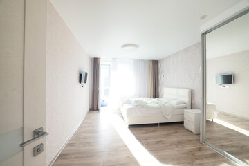 Obraz na płótnie Canvas bright bedroom interior hotel, white background home