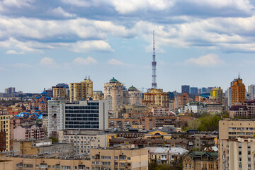 Kyiv, Ukraine - April 24, 2023: The streets of Kyiv city and Kyiv TV Tower.