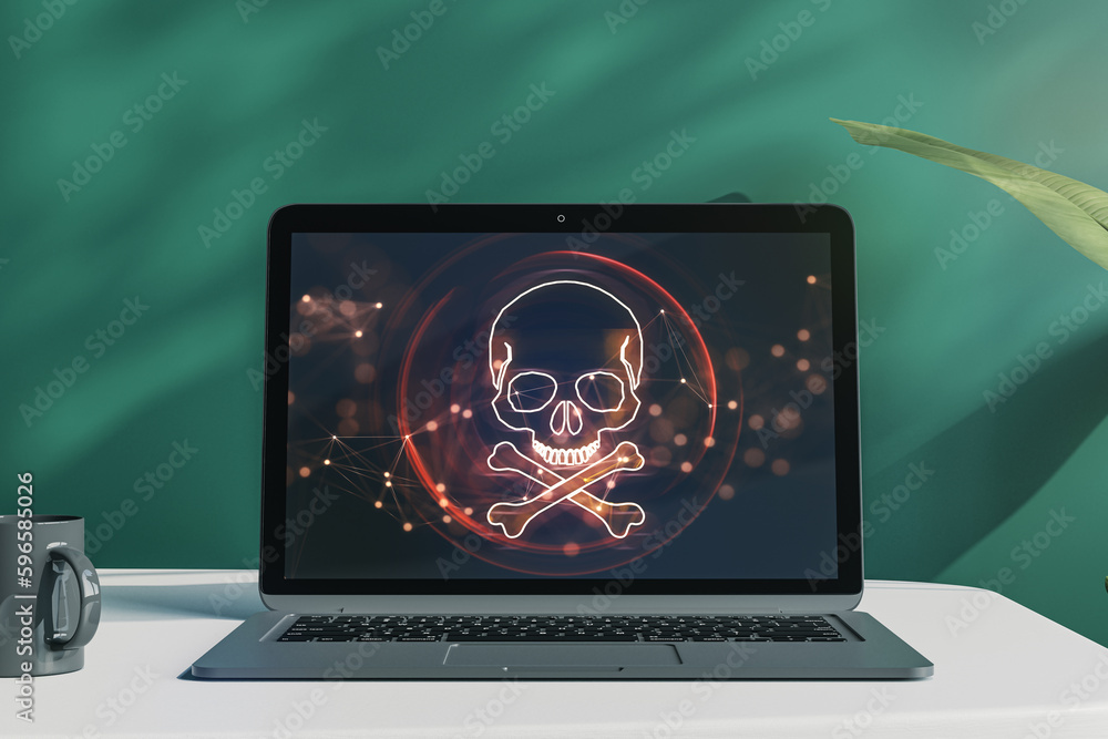 Poster close up of laptop with digital red skull on screen, placed on desktop and chalkboard wall backgroun