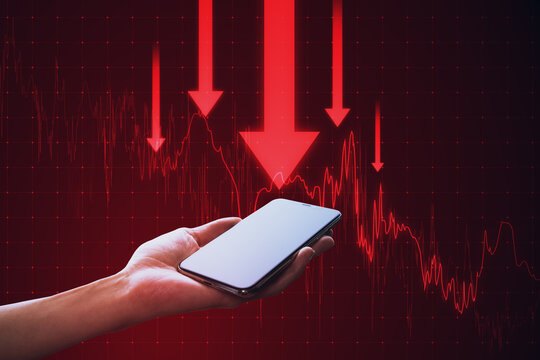 Close up of female hands holding mobile phone with downward red business chart and arrows on blurry background. Crisis, recession and financial failure concept.