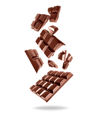 Whole and broken dark chocolate bars in the air isolated on white background